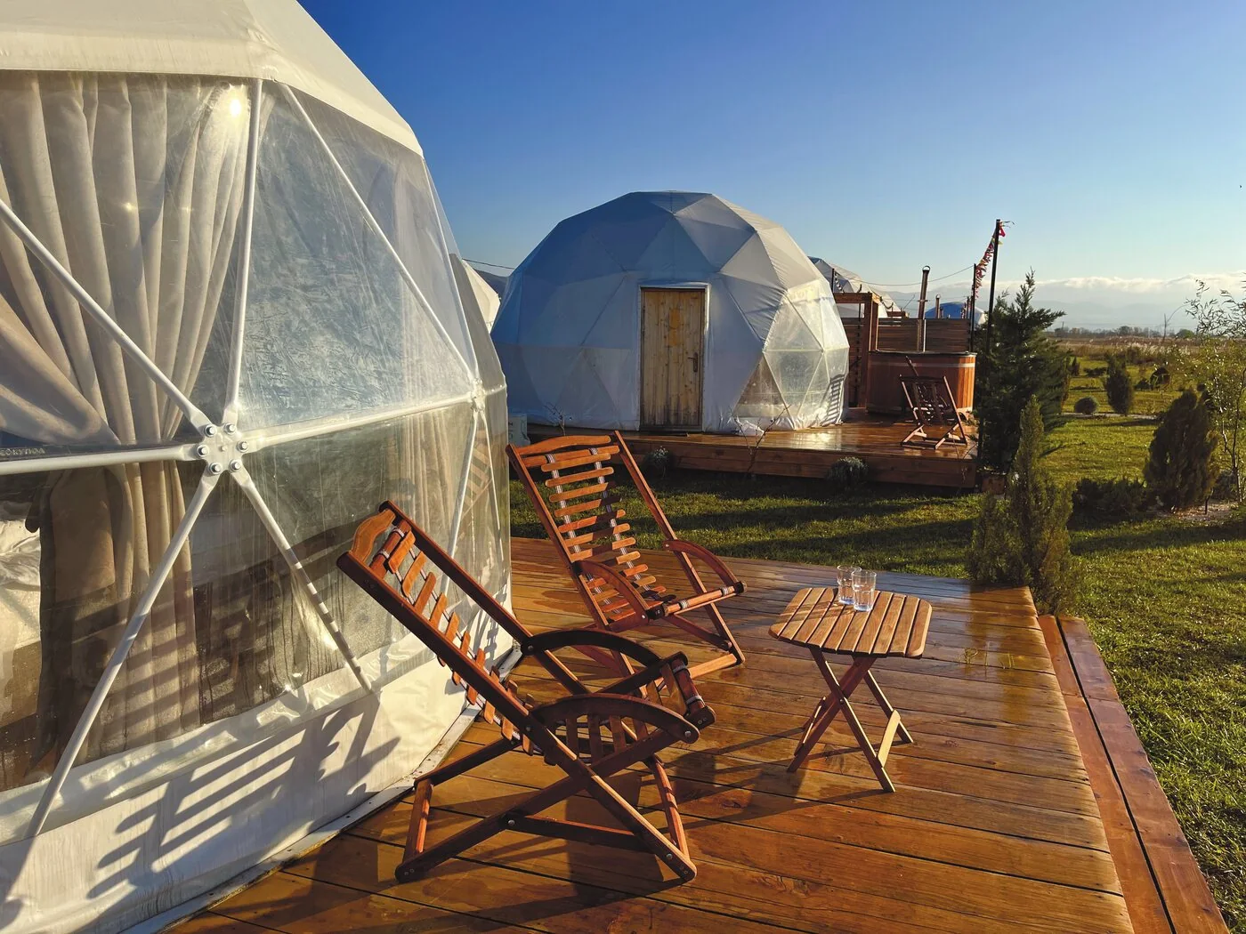 Dome terrace with wooden furniture
